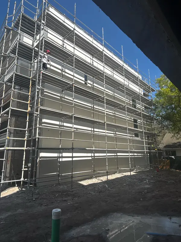Townhome exterior · Scaffolding up — Ann & Gaby Painting project (exterior)